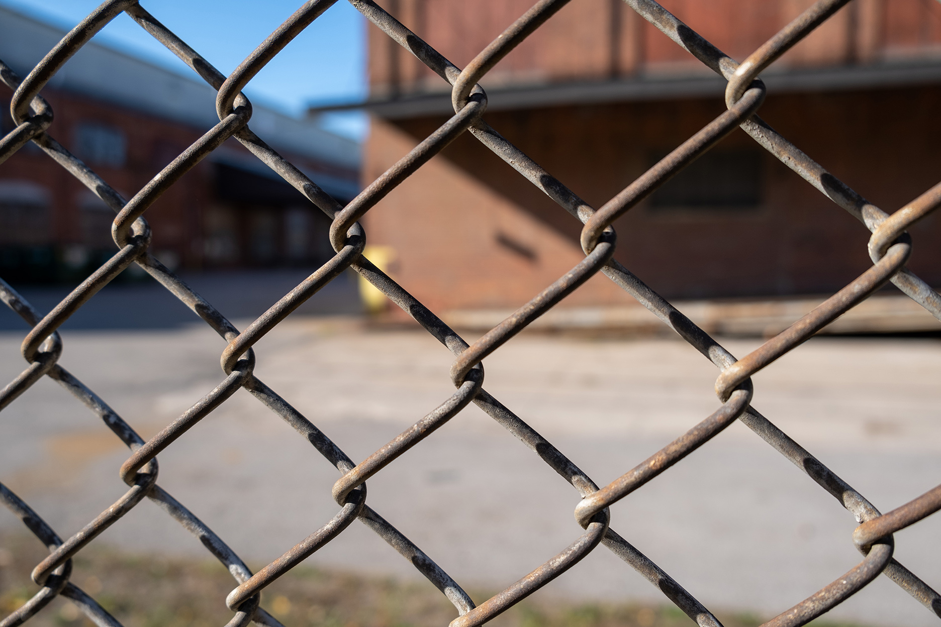 Photo of GE through a fence, taken by Anne White.